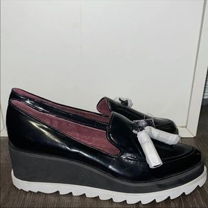 Sixty seven black loafers